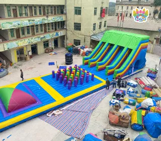 Giant Rainbow Inflatable Obstacle Course – The Ultimate Event Attraction