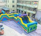 Giant Rainbow Inflatable Obstacle Course – The Ultimate Event Attraction