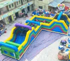 Giant Rainbow Inflatable Obstacle Course – The Ultimate Event Attraction