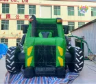 Giant Green Inflatable Themed Play Structure: Adventure on Wheels for Kids
